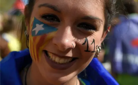 AFP Woman with Catalan flag painted on her face, 11 Sep 17
