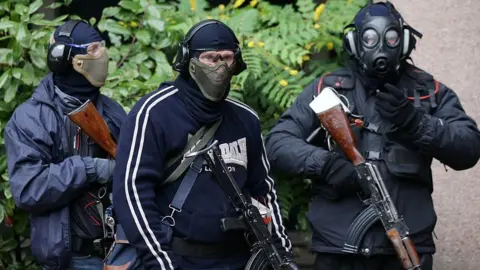 Getty Images Met Police officers dressed up as terrorists