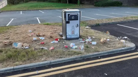 Powys council Litter overflowing in Newtown