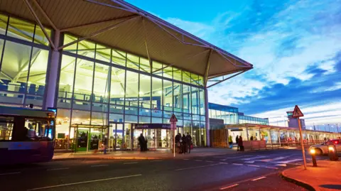 Getty Images The arrivals entrance of Bristol Airport which includes the walkway from the drop-off car park, where charges will rise