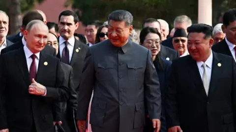 Reuters Russian President Vladimir Putin, Chinese President Xi Jinping, North Korean leader Kim Jong Un and heads of foreign delegations arrive for a military parade