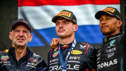 Adrian Newey, Max Verstappen and Lewis Hamilton on the podium in Canada in 2023