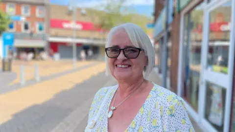 Pam Jackson pictured in front of the Wilko store in Sutton in Ashfield