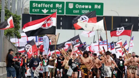 Getty Images Hikoi members cross the Auckland Harbor Bridge on the third day of a nine-day trip to Wellington on November 13, 2024 in Auckland, New Zealand. 