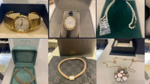 A composite image showing six of the stolen items. Clockwise from top left: A large watch with gold strap; a smaller, oval watch with gold edging and a thin black strap; a pearl necklace; a gold chain with a large round pendant made up of different shaped and coloured stones; a gold coloured Gucci bracelet threaded through a short gemstone tube; a gold bracelet wound in a rope style.