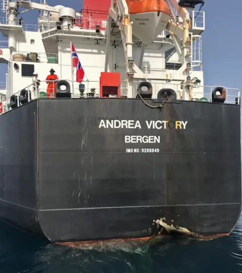 HANDOUT A picture taken of Norwegian oil tanker Andrea Victory with damage to its side