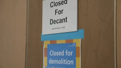 Signs saying "Closed for demolition" 