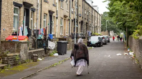 BBC/Steve Morgan Woman on Halifax street