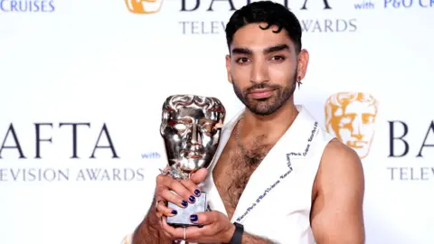 PA Media Mawaan Rizwan in the press room after winning the Male Performance in a Comedy award for Juice at the BAFTA TV Awards 2024, at the Royal Festival Hall in London.