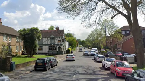 Google image of Bessborough Road, Harrow, a road lined with houses 