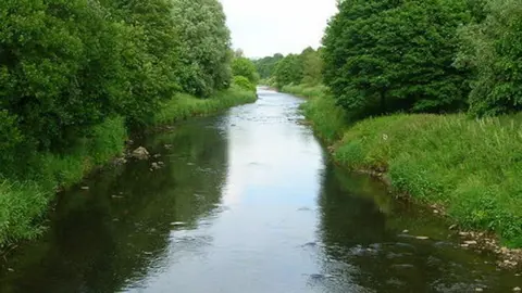 John H Darch/Geograph River Calder from footbridge at Padiham