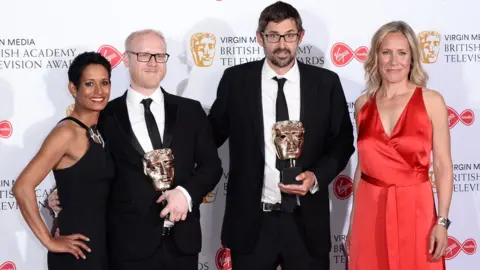 Getty Images Arron Fellows and Louis Theroux receive the best factual series Bafta in 2019 from presenters Naga Munchetty and Sophie Raworth