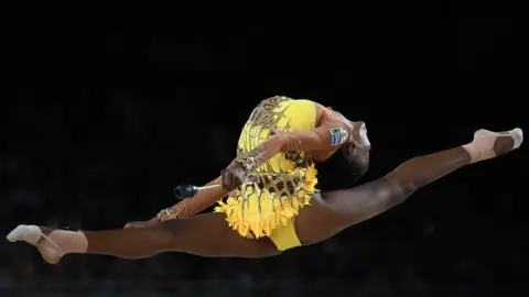 Getty Images Grace Legote competes in the clubs event of the rhythmic gymnastics individual all-around final during the 2018 Gold Coast Commonwealth Games at the Coomera Indoor Sports Centre on the Gold Coast on April 12, 2018
