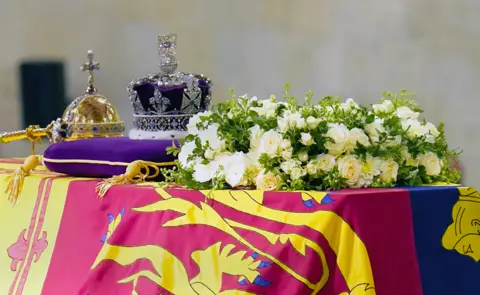 Reuters Flowers on top of the coffin in Westminster Hall