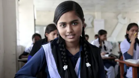 Ricci Coughlan/DFID/Flickr Mim Akter, 16, seen in a school in Bangladesh in a handout photo from the former Department for International Development