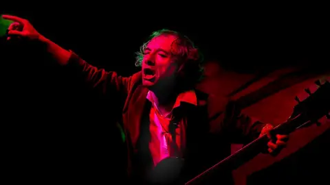 Paul Grant Photo of a musician from the AC/DC tribute band, titled "Guitar man" - voted second in Advanced Open Projected