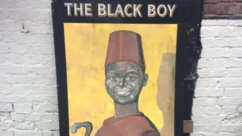 Louise Presley Black Boy sign