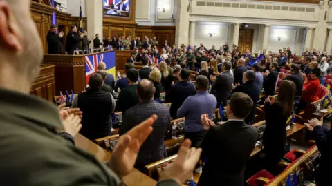 Getty Images Rishi Sunak addressing Ukraine's Parliament