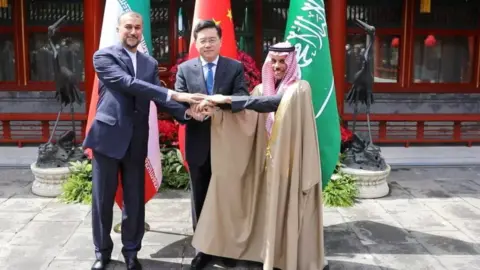 Reuters Iranian Foreign Minister Hossein Amir-Abdollahian (L) shakes hands with his Saudi counterpart Prince Faisal bin Farhan Al Saud (R) at a meeting in Beijing, China, hosted by Chinese Foreign Minister Qin Gang (6 April 2023)