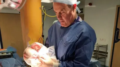 Laura Thomas Martyn Pitman