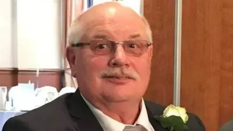 Roger Leadbeater, a man in his 70s with short grey hair and a grey moustache