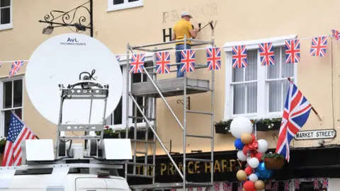Getty Images The Three Tuns pub in Windsor having its temporary name "The Prince Harry" painted on