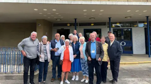 Campaigners celebrating outside of Durham County Hall when the plans for the football centre were rejected