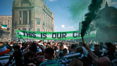 SNS Celtic fans holding a banner reading 'This is our city'.