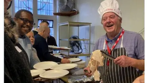 The Sunday Centre Christmas Dinner with Sunday Centre volunteers in December 2019