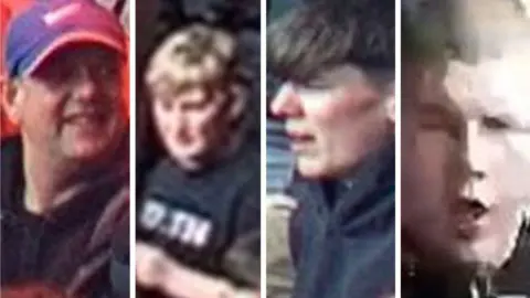 A split image of the four men police would like to speak to. 
The first man is wearing a blue and red baseball cap and black jacket. 
The second is wearing a black t shirt with white text. 
The third is in a black jacket. 
The fourth photo shows a man with a shaved head and open mouth.