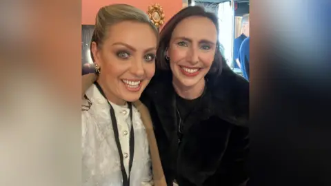 Rebecca Horne Ms Horne with Strictly's star Amy Dowden backstage at the Royal Variety Show. Both are smiling for the camera