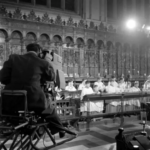 Picture shows rehearsal shots of King's College, Cambridge Chapel Choir with BBC cameras in the Chapel aisle for Carols at King's in 1954