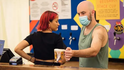 Getty Images Festival bar staff adapting to Covid rules