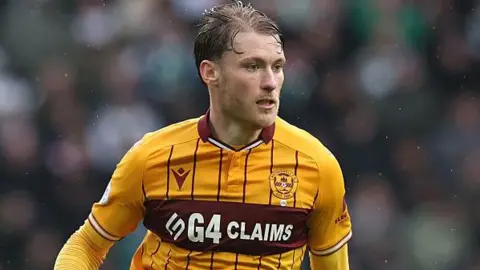 Callum Slattery in action for Motherwell against Celtic in March.