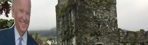 Joe Biden cut-out watches a parade in his honour in Carlingford