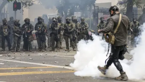 US federal agents fire smoke grenades at protesters in Los Angeles' suburb of Paramount, California. Photo: 7 June 2025