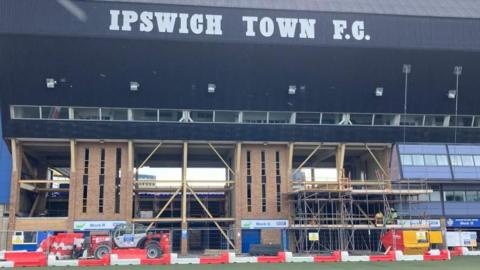 Work taking place at Portman Road below Ipswich Town sign