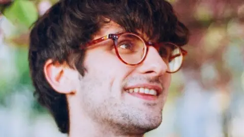 Family handout/PA Media Alex Theodossiadis smiling