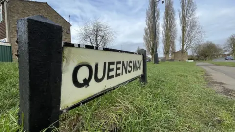 Ben Schofield/BBC A Queensway road sign