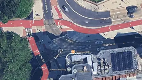 Bristol City Council A google street aerial snap showing a road system in Bristol with a red cycle lane through it.