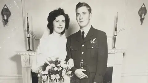 The MacCallum family Rosemary and George MacCallum on their wedding day, 14 July 1945