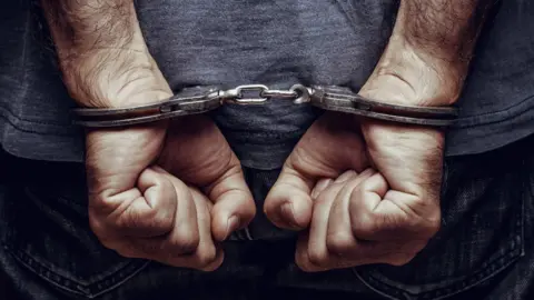 Getty Images Handcuffs