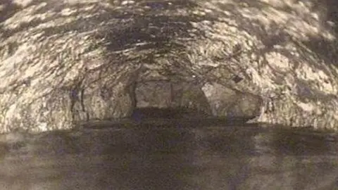 BDPW The inside of the Baltimore sewer was caked in congealed fat