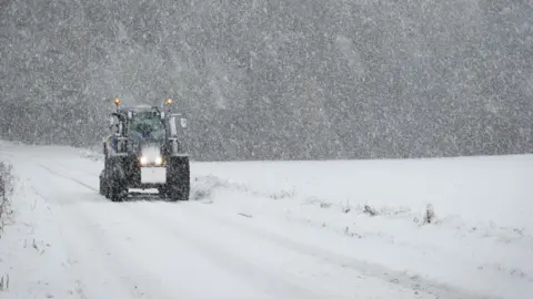 BBC Weather Watchers / Gingkolide A tractor manoeuvres through heavy snowfall in the village of Meikleour, in Perth and Kinross