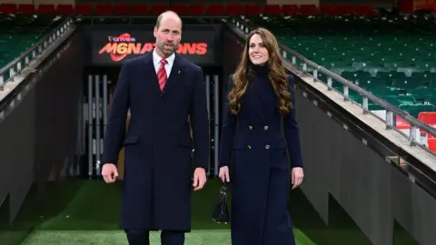 Getty Images The Prince and Princess of Wales stand side by side at the Principality Stadium in 2025
