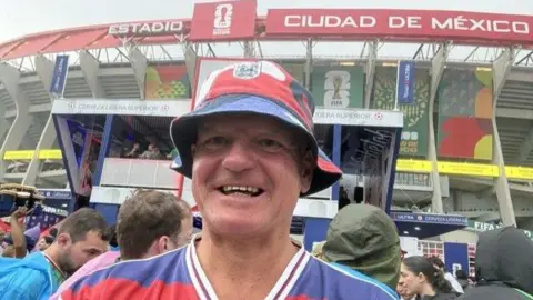 Darren Thompson outside the Mexico City Stadium for the World Cup match between England and Mexico on 5 July.