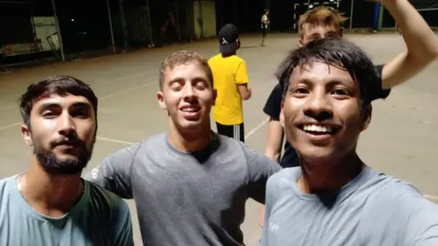 Dhan Bahadur Chaudhary Last selfie taken at the Kibbutz Alumim basketball court, showing Bipin, Dhan Bahadur and Israeli friends