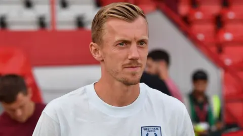 James Ward-Prowse looks on from the sidelines 