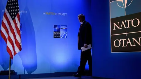 AFP US President Donald Trump arrives for a press conference on the second day of the North Atlantic Treaty Organization (NATO) summit in Brussels on July 12, 2018.