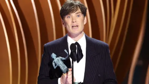 Getty Images Cillian Murphy accepts the Outstanding Performance by a Male Actor in a Leading Role award for “Oppenheimer” onstage during the 30th Annual Screen Actors Guild Awards at Shrine Auditorium and Expo Hall on February 24, 2024 in Los Angeles, California.